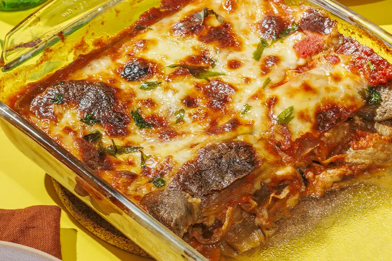 Queso La Florida - Eggplant lasagna with sliced Fitchiss cheese. Complementary